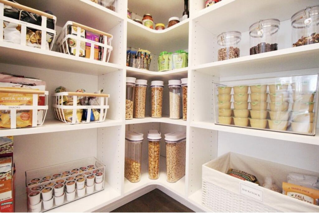 A home pantry with bins and baskets