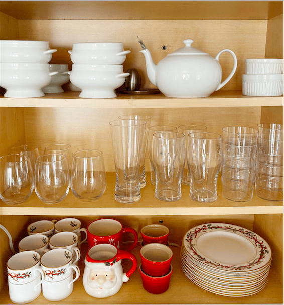 Christmas dishes in a cabinet