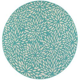 round outdoor rug with teal floral pattern