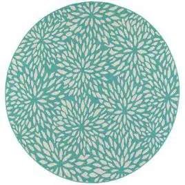 round outdoor rug with teal floral pattern